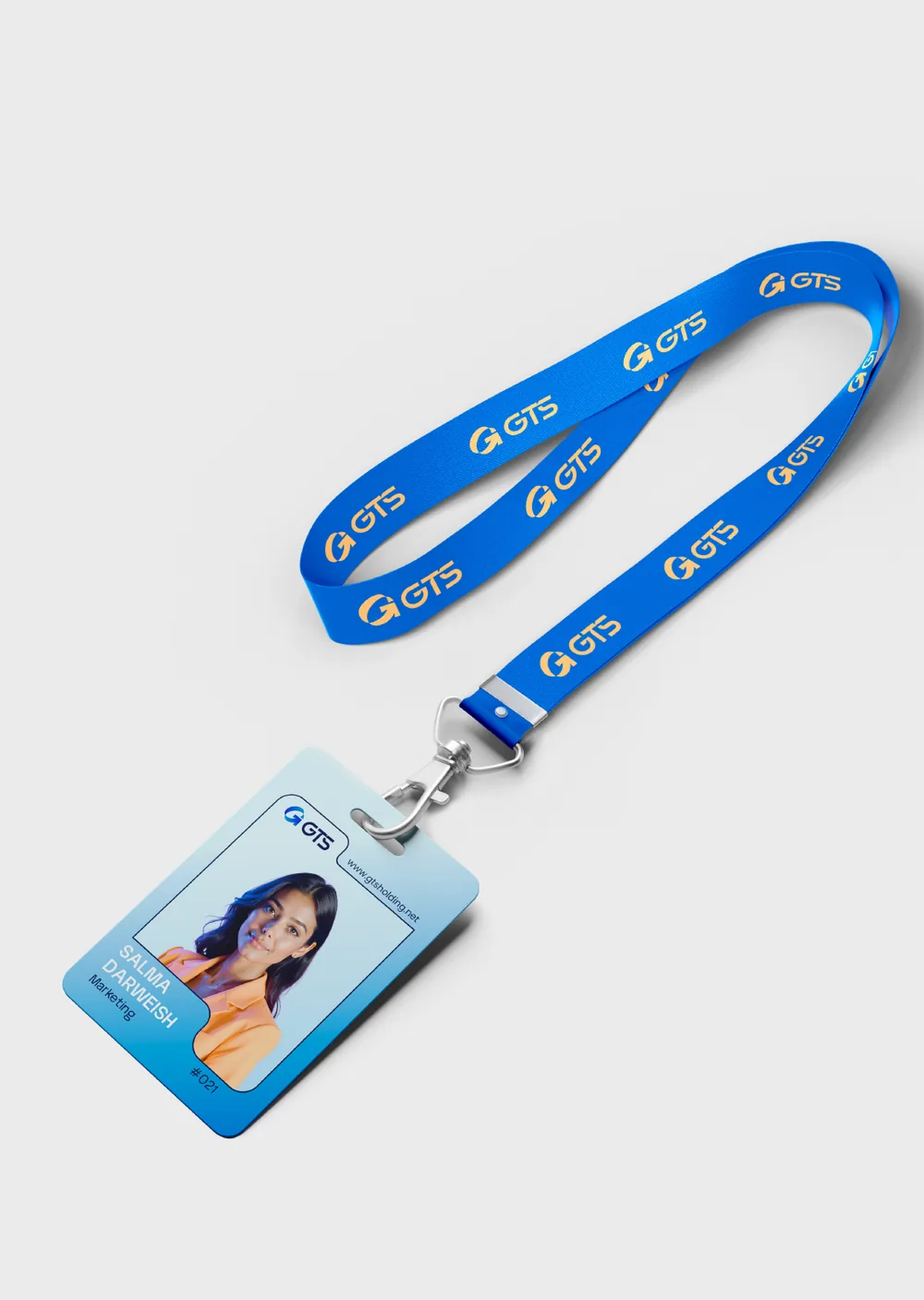 GTS Holding branded lanyard and employee ID badge