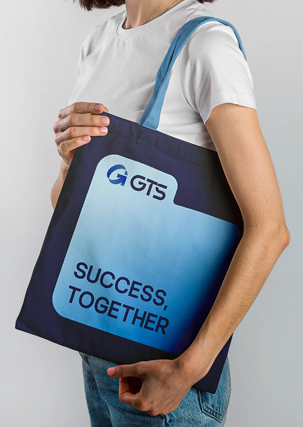 GTS Holding branded tote bag with the line Success, Together